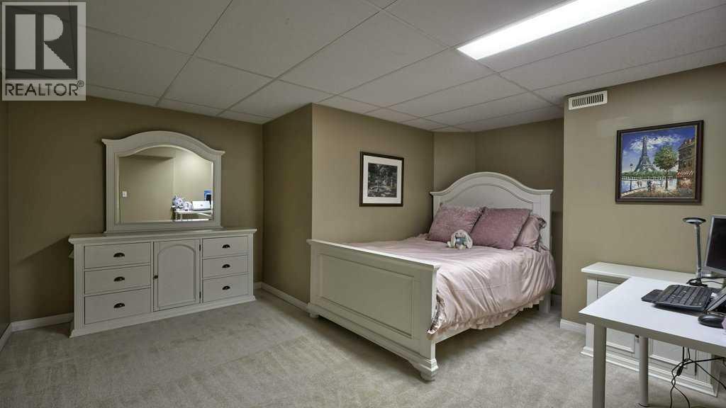 Single Family House Bungalow for Sale in  Sierra Morena Green SW Signal Hill Calgary 