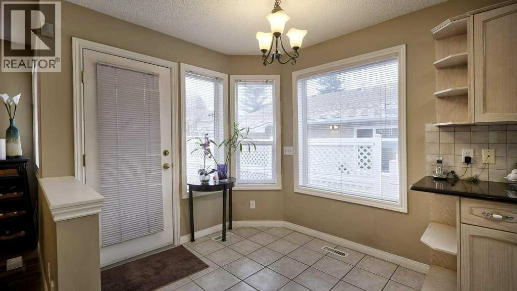 Single Family House Bungalow for Sale in  Sierra Morena Green SW Signal Hill Calgary 