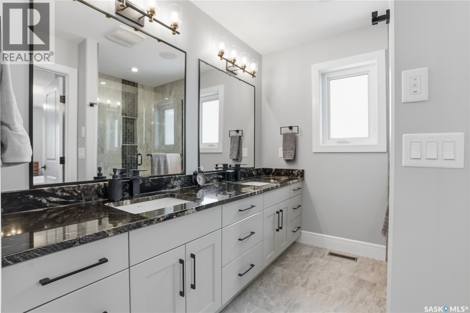 Single Family House 2 Level for Sale in  Mahabir COURT Saskatoon 