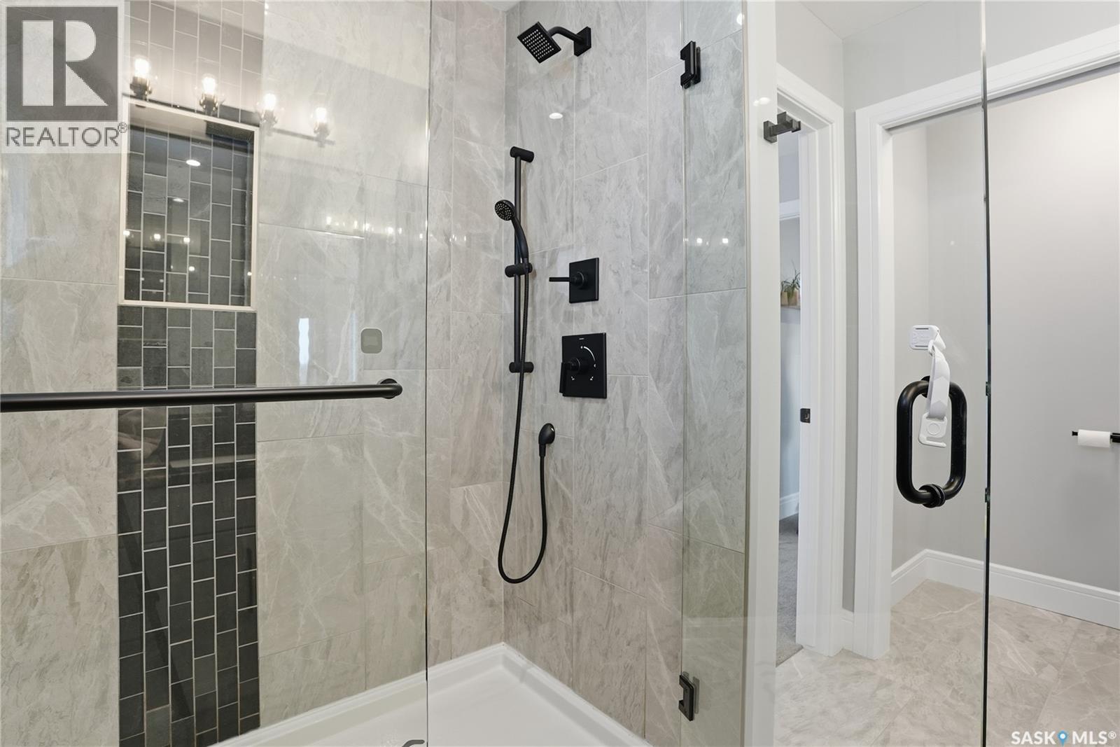 Single Family House 2 Level for Sale in  Mahabir COURT Saskatoon 