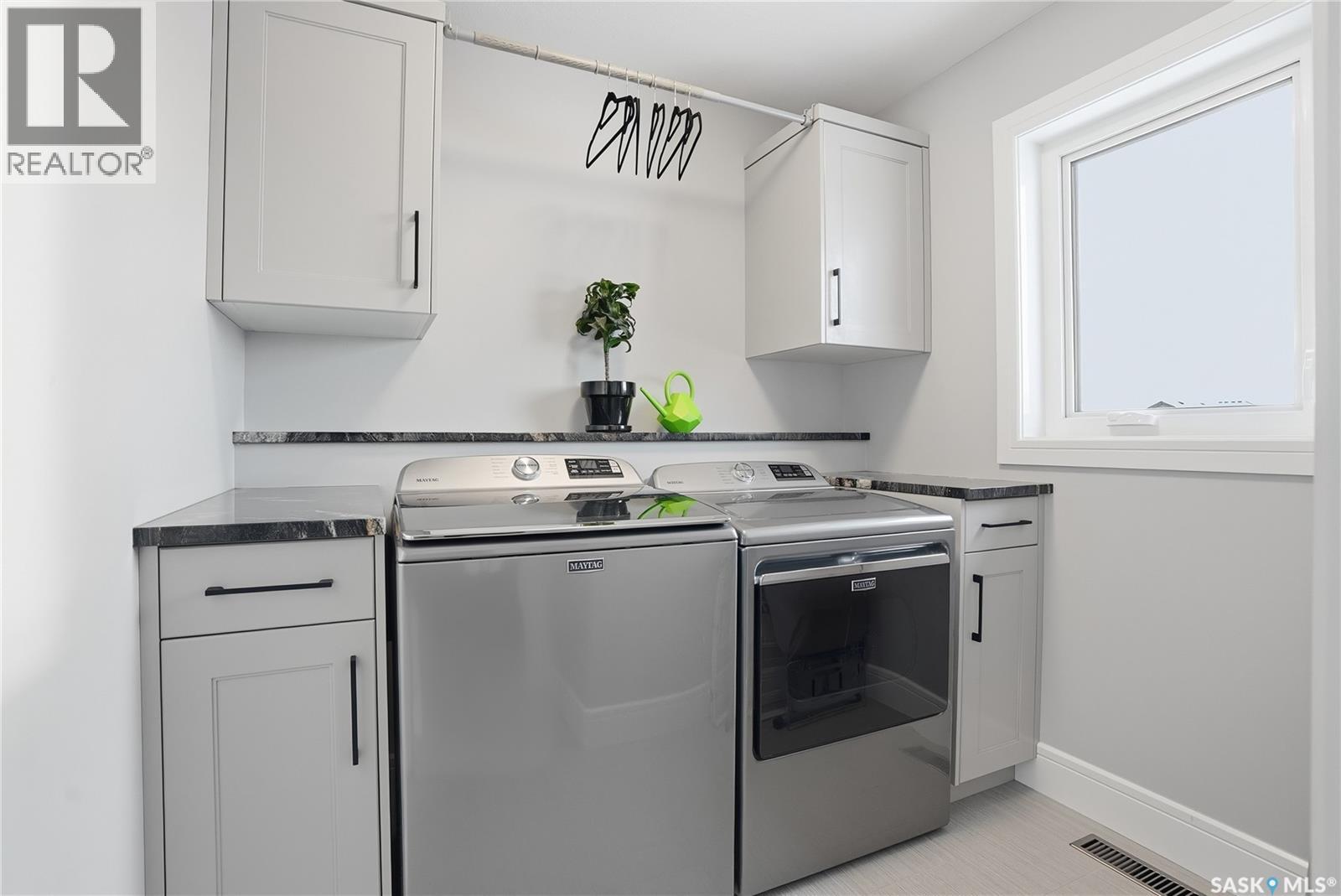 Single Family House 2 Level for Sale in  Mahabir COURT Saskatoon 