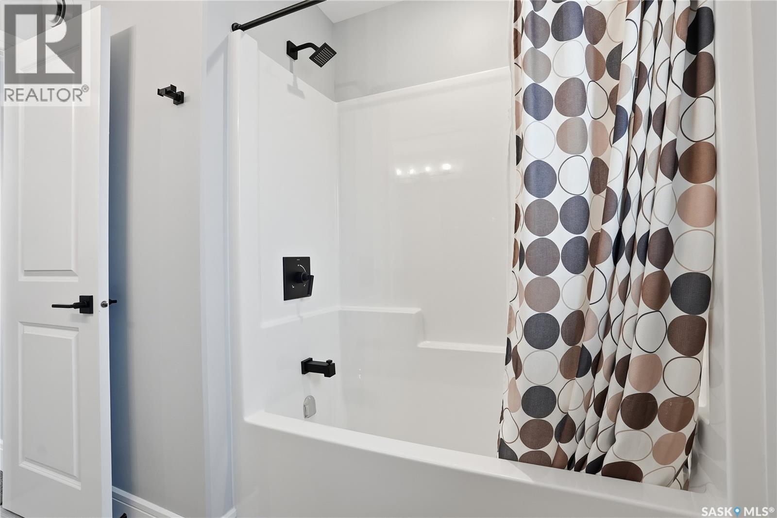 Single Family House 2 Level for Sale in  Mahabir COURT Saskatoon 