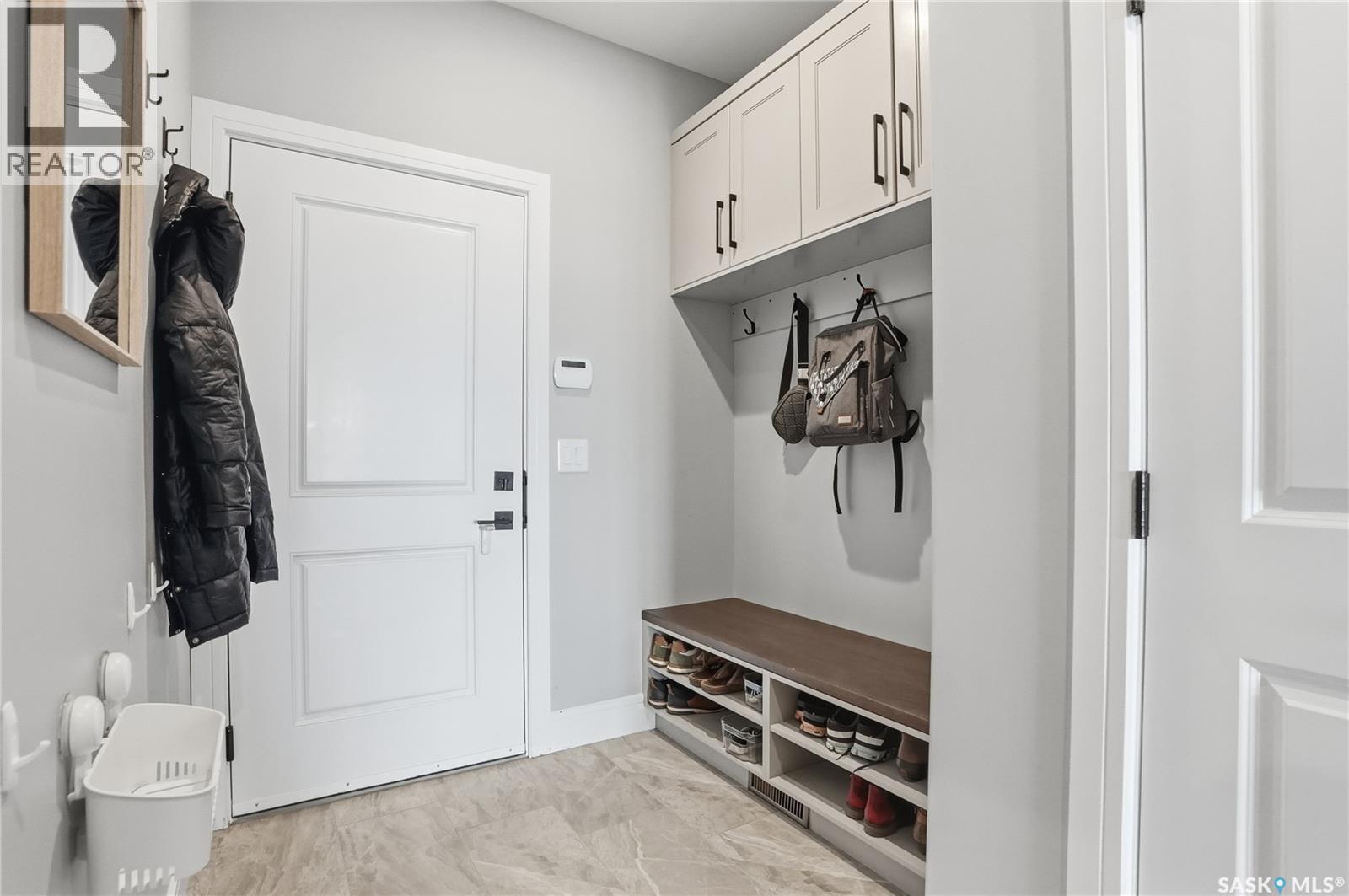 Single Family House 2 Level for Sale in  Mahabir COURT Saskatoon 