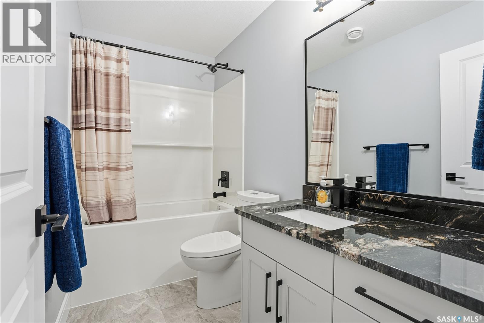 Single Family House 2 Level for Sale in  Mahabir COURT Saskatoon 