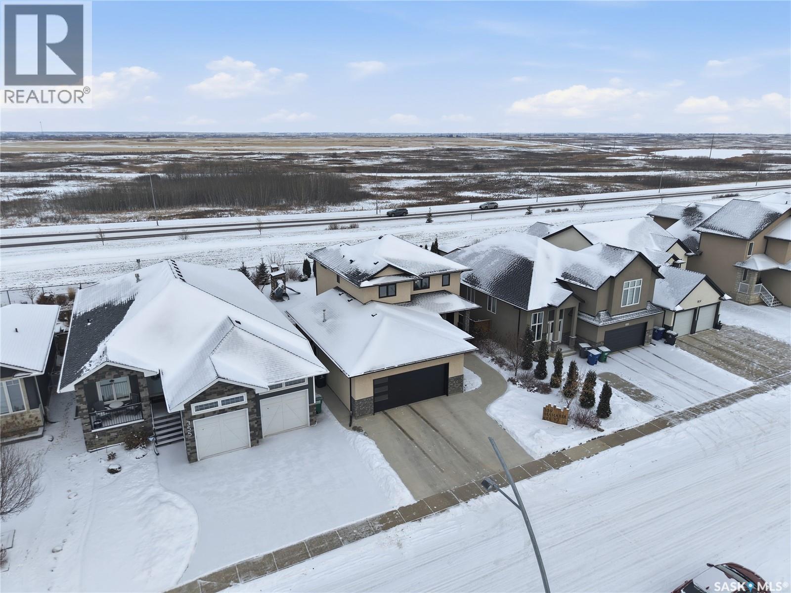 Single Family House 2 Level for Sale in  Mahabir COURT Saskatoon 