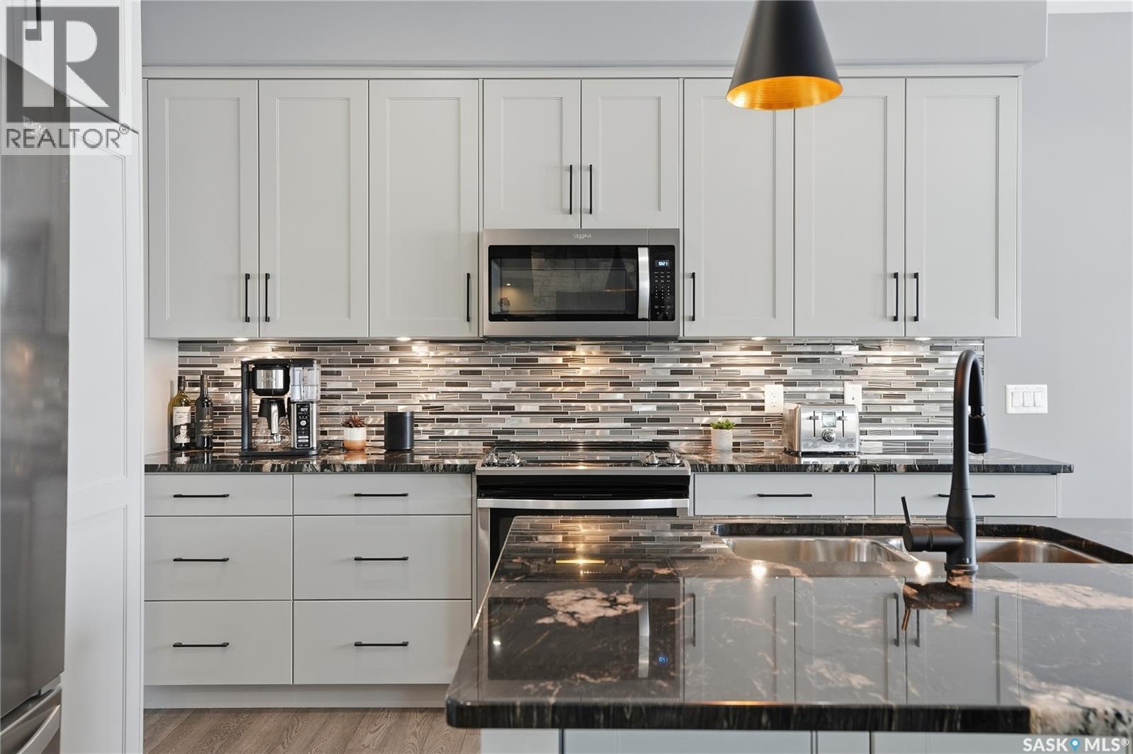 Single Family House 2 Level for Sale in  Mahabir COURT Saskatoon 