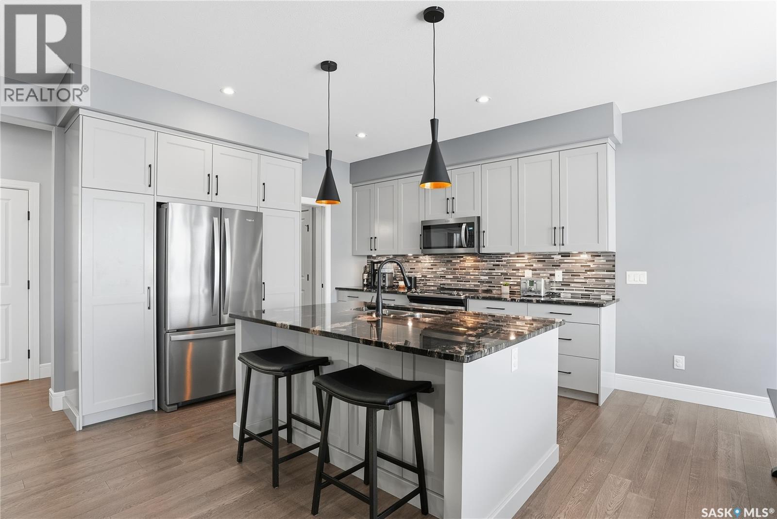 Single Family House 2 Level for Sale in  Mahabir COURT Saskatoon 