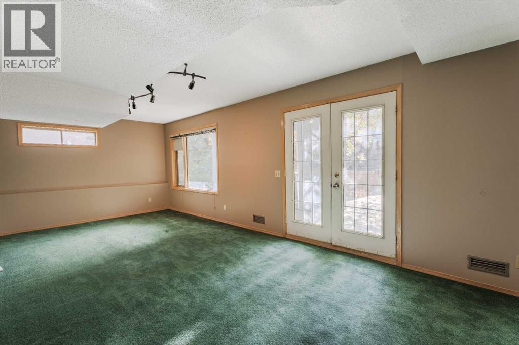 Single Family House for Sale in  Canterbury Court SW Canyon Meadows Calgary 