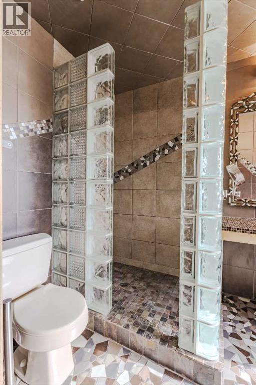 Single Family House for Sale in  Canterbury Court SW Canyon Meadows Calgary 