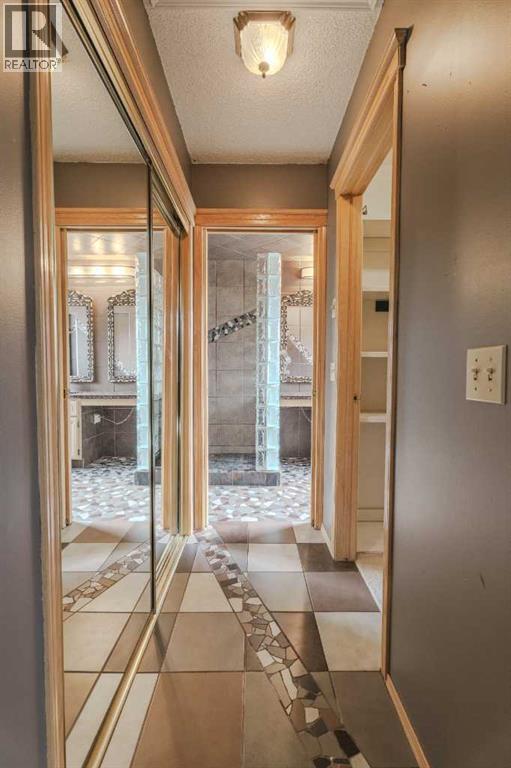 Single Family House for Sale in  Canterbury Court SW Canyon Meadows Calgary 