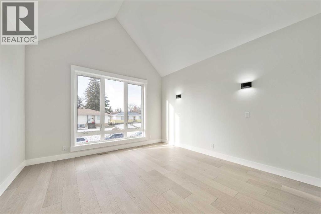 Single Family House for Sale in   Street SW Rosscarrock Calgary 