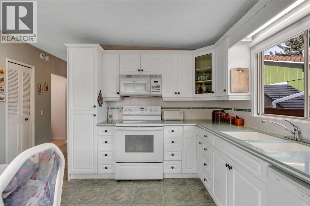 Single Family House Bungalow for Sale in  Dalcastle Hill NW Dalhousie Calgary 