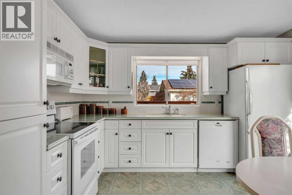 Single Family House Bungalow for Sale in  Dalcastle Hill NW Dalhousie Calgary 