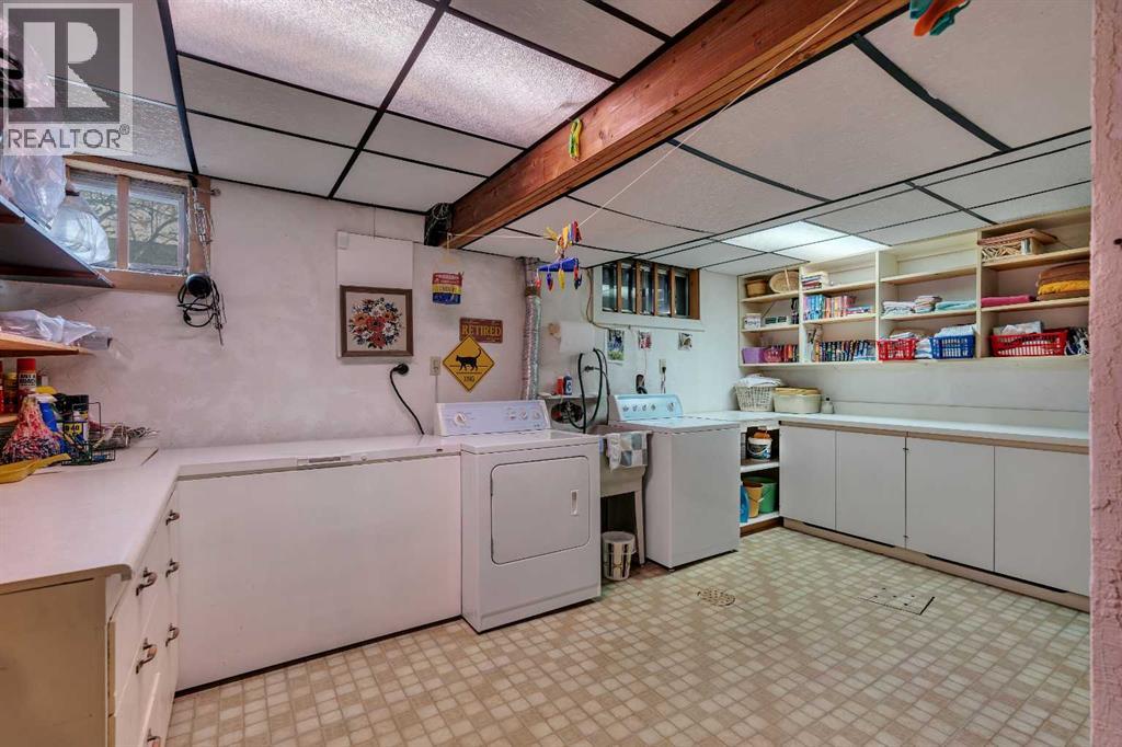 Single Family House Bungalow for Sale in  Dalcastle Hill NW Dalhousie Calgary 