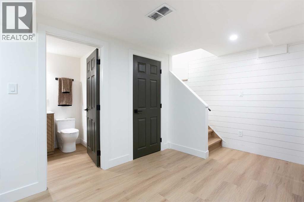 Single Family House Bungalow for Sale in  Parkwood Way SE Parkland Calgary 