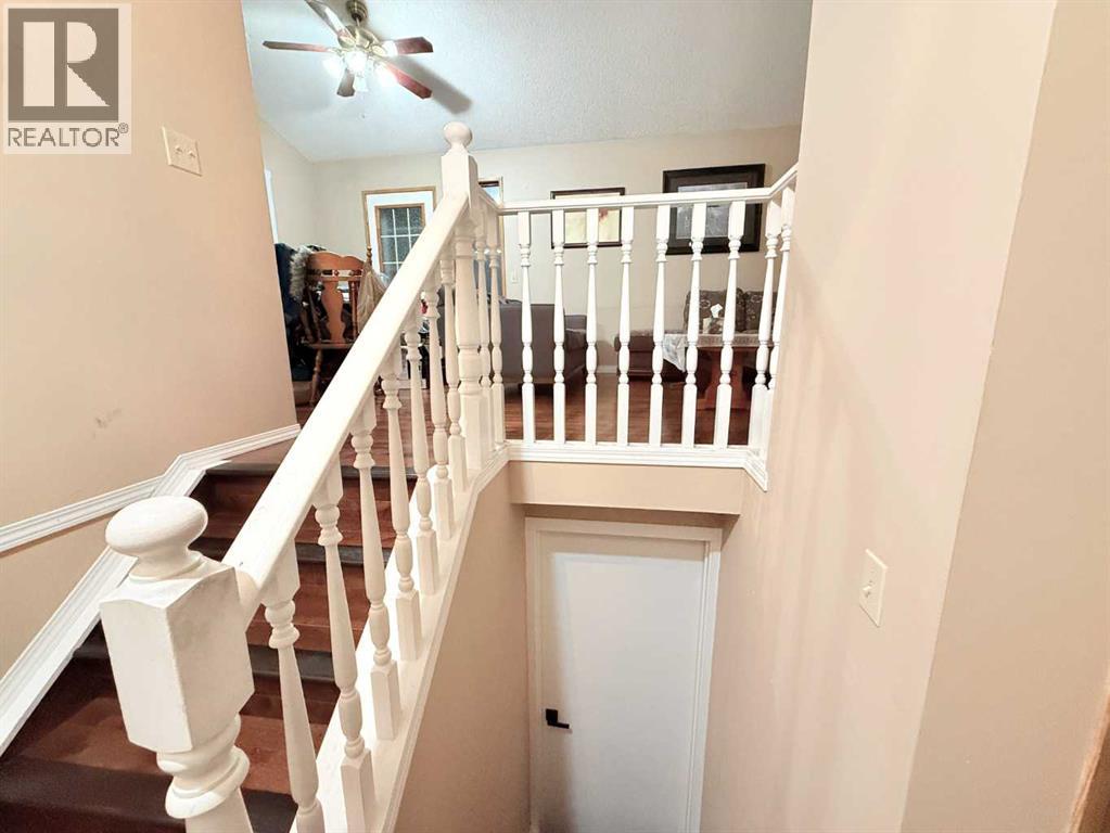 Single Family House Bi-level for Sale in  Laguna Way NE Monterey Park Calgary 