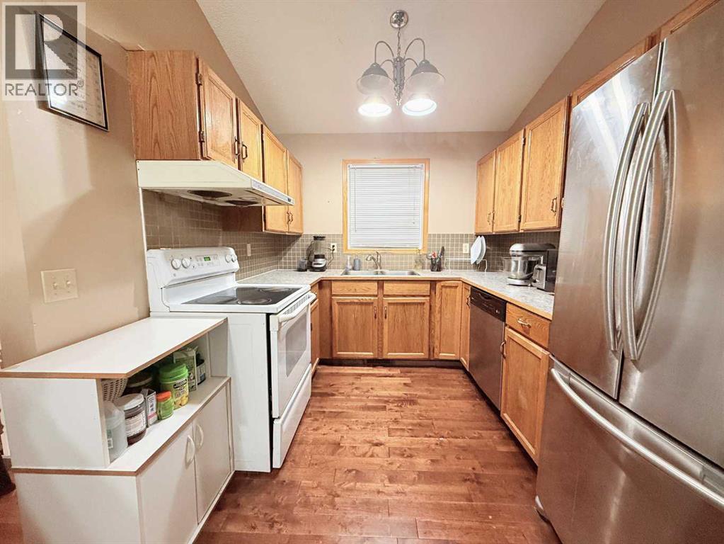 Single Family House Bi-level for Sale in  Laguna Way NE Monterey Park Calgary 