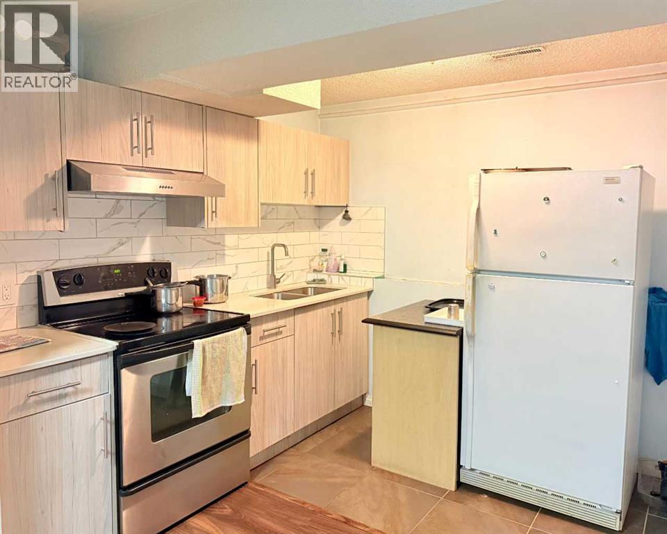 Single Family House Bi-level for Sale in  Laguna Way NE Monterey Park Calgary 