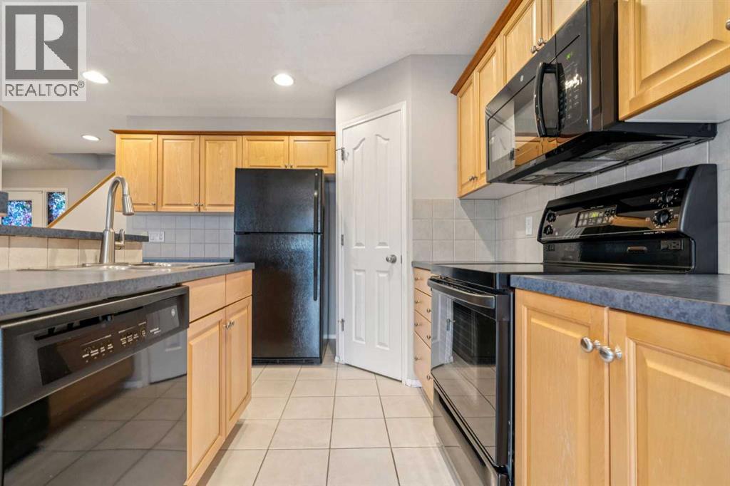 Single Family House for Sale in  Everwillow Close SW Evergreen Calgary 