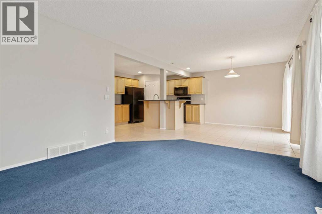 Single Family House for Sale in  Everwillow Close SW Evergreen Calgary 