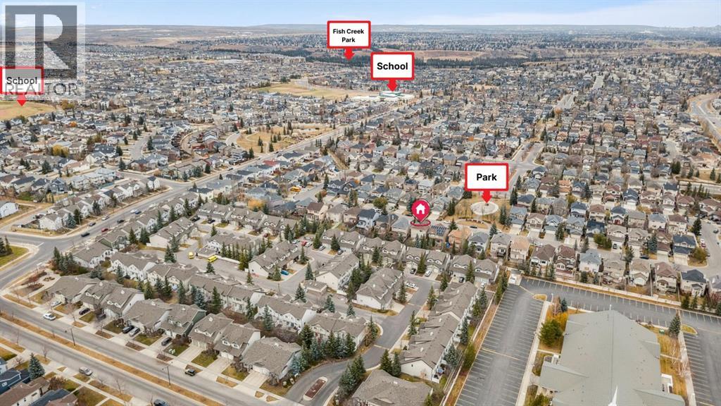 Single Family House for Sale in  Everwillow Close SW Evergreen Calgary 