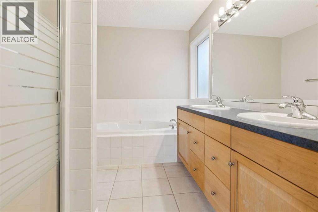 Single Family House for Sale in  Everwillow Close SW Evergreen Calgary 