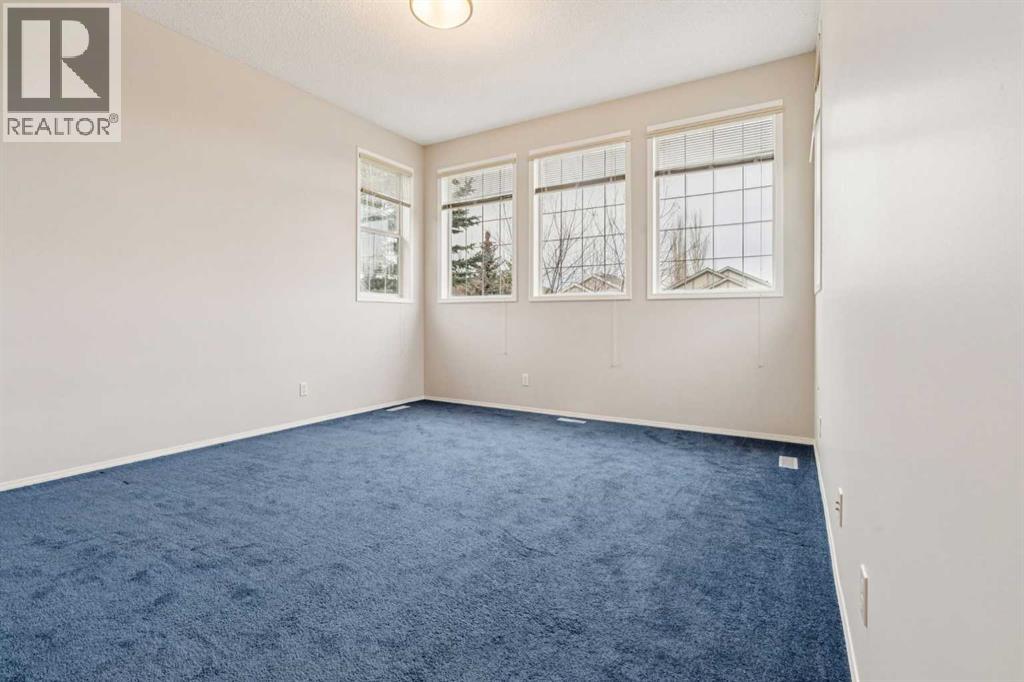 Single Family House for Sale in  Everwillow Close SW Evergreen Calgary 