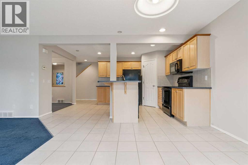 Single Family House for Sale in  Everwillow Close SW Evergreen Calgary 