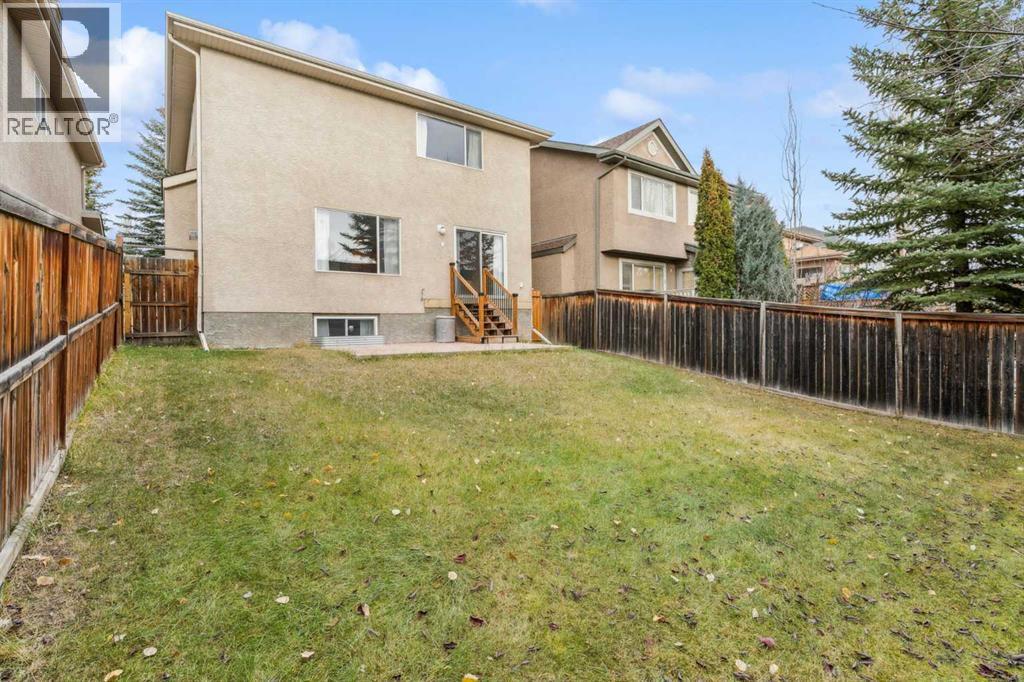 Single Family House for Sale in  Everwillow Close SW Evergreen Calgary 