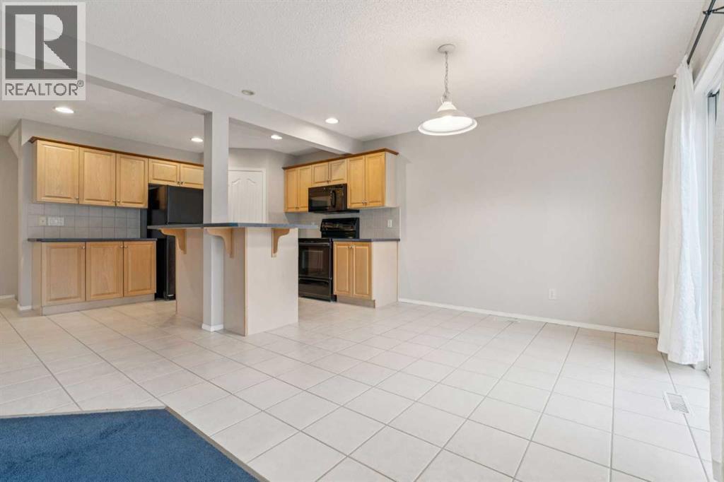 Single Family House for Sale in  Everwillow Close SW Evergreen Calgary 