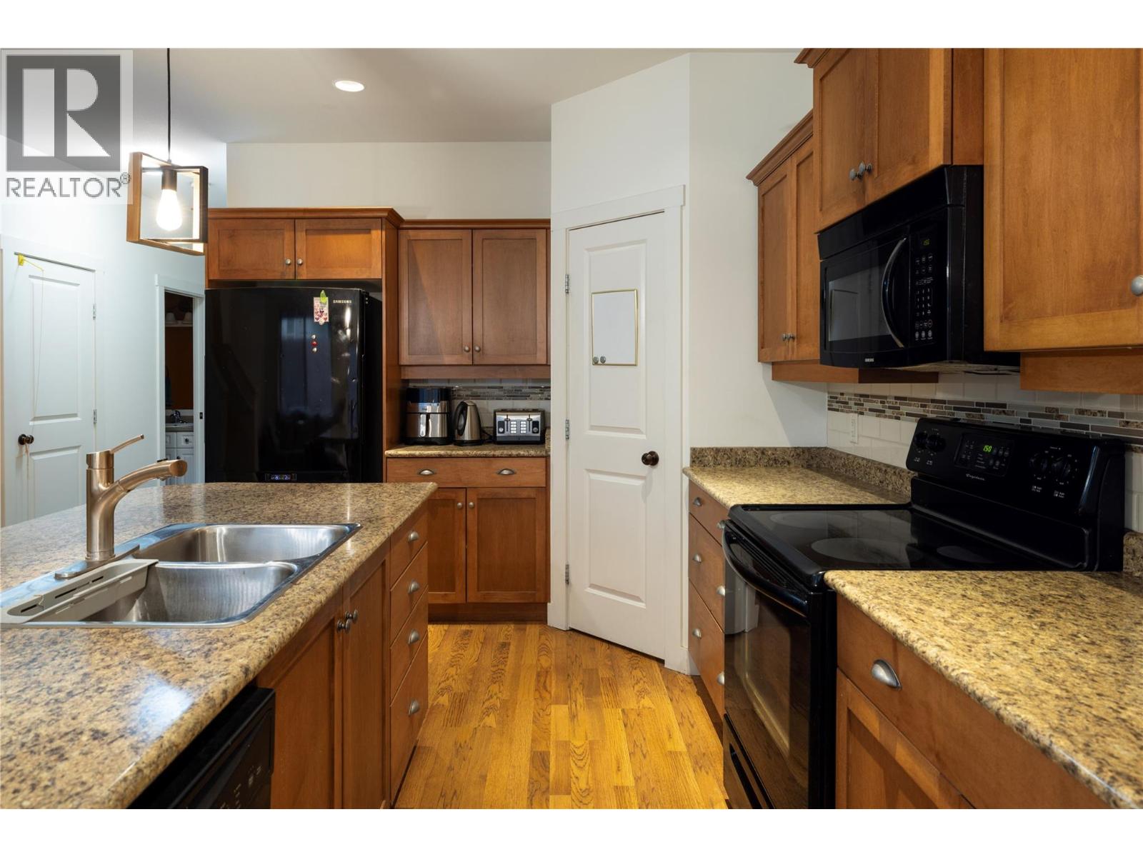 #208 10634 Powley Court - 10