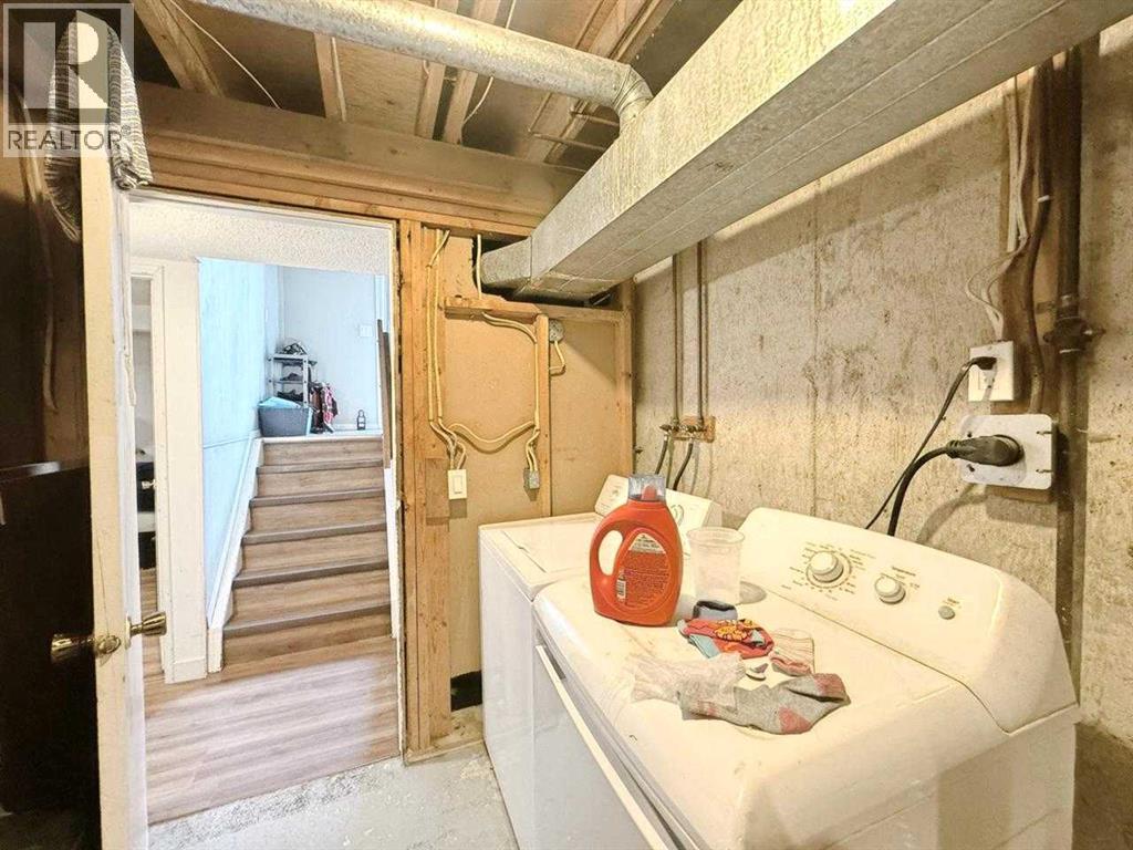 Single Family House Bi-level for Sale in A  Braxton Place SW Braeside Calgary 