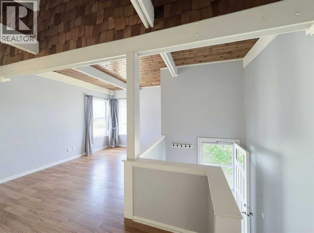 Single Family House Bi-level for Sale in A  Braxton Place SW Braeside Calgary 