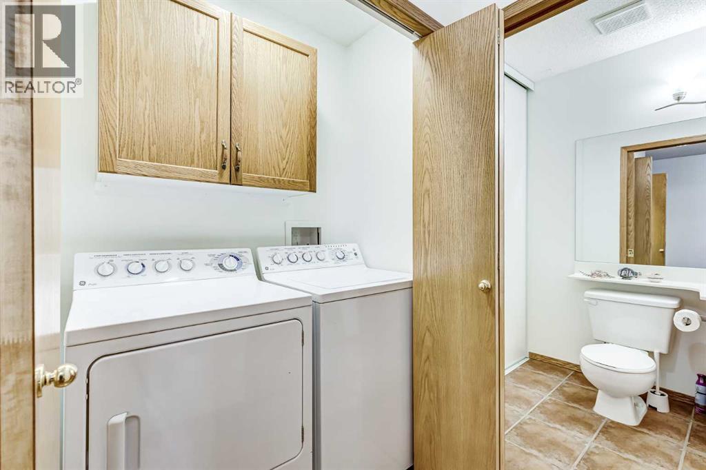 Single Family House Bungalow for Sale in  Signature Villas SW Signal Hill Calgary 