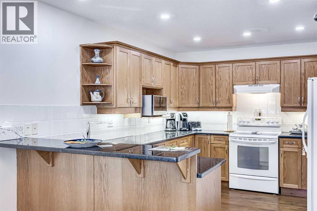 Single Family House Bungalow for Sale in  Signature Villas SW Signal Hill Calgary 