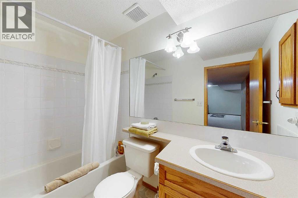 Single Family House Bungalow for Sale in  Signature Villas SW Signal Hill Calgary 