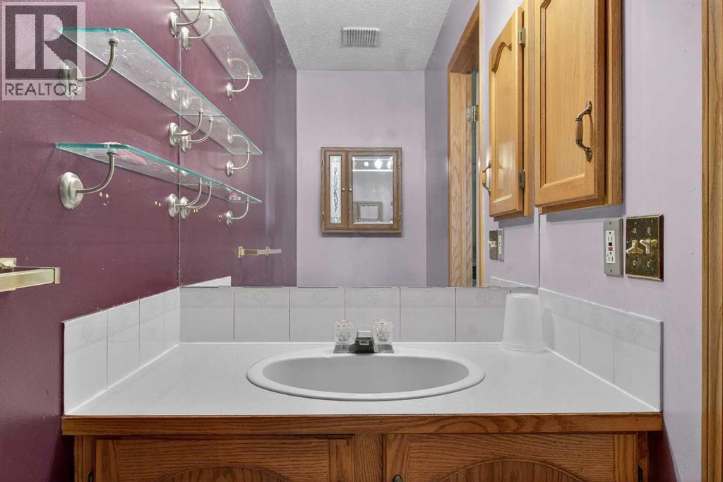 Single Family House Bi-level for Sale in  Erin Circle SE Erin Woods Calgary 