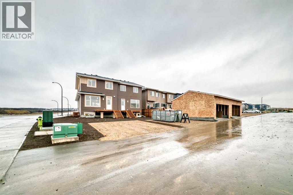 Single Family House for Sale in  Marmot Green NW Glacier Ridge Calgary 