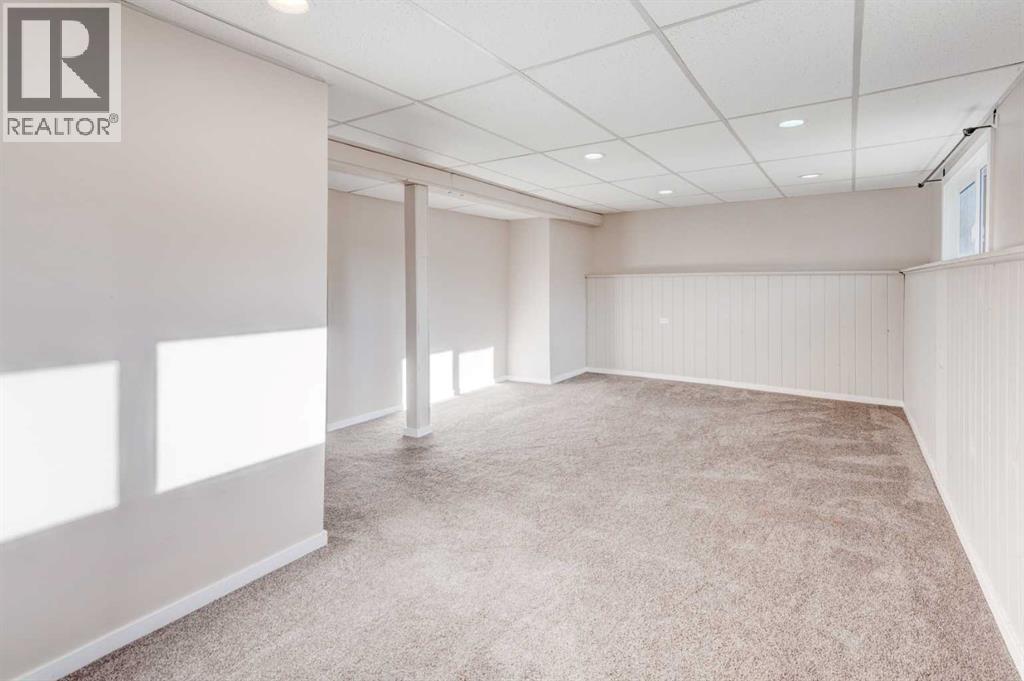 Single Family House Bi-level for Sale in  Midridge Gardens SE Midnapore Calgary 