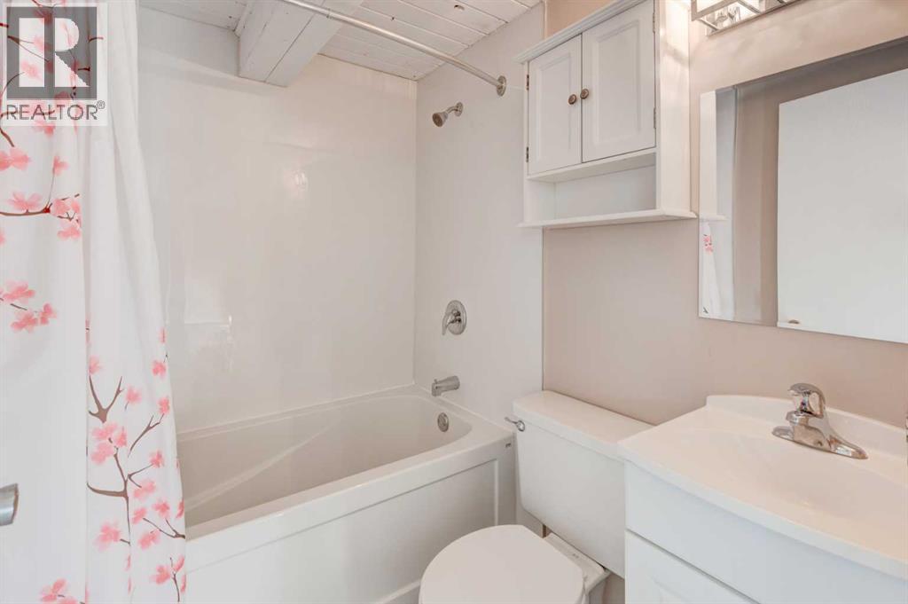 Single Family House Bi-level for Sale in  Midridge Gardens SE Midnapore Calgary 