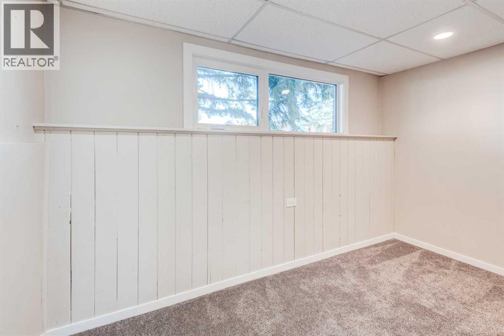 Single Family House Bi-level for Sale in  Midridge Gardens SE Midnapore Calgary 