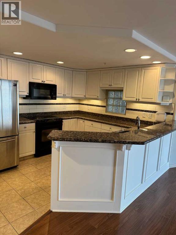 Single Family House for Sale in    Street SW Downtown West End Calgary 