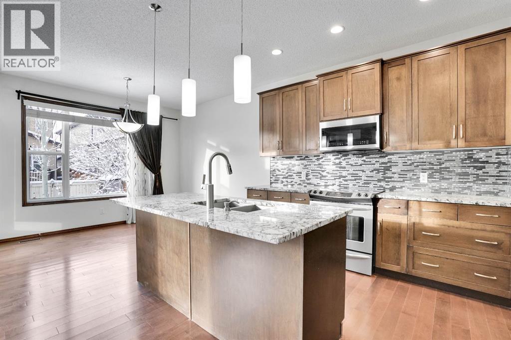 Single Family House for Sale in  Everoak Green SW Evergreen Calgary 