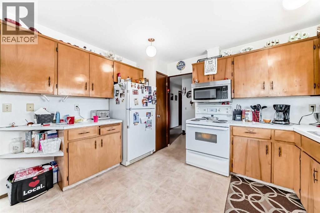 Multi-family House Bi-level for Sale in  Rundlehorn Drive NE Pineridge Calgary 