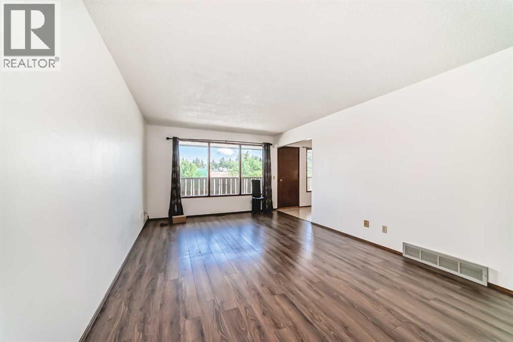 Multi-family House Bi-level for Sale in  Rundlehorn Drive NE Pineridge Calgary 