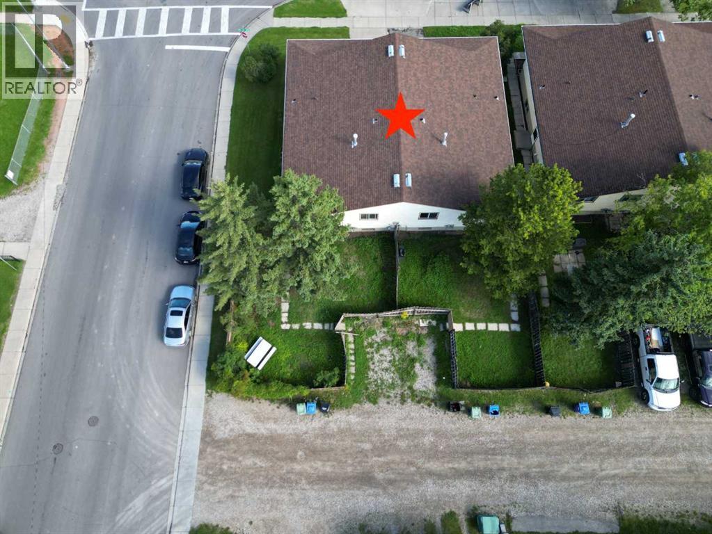 Multi-family House Bi-level for Sale in  Rundlehorn Drive NE Pineridge Calgary 