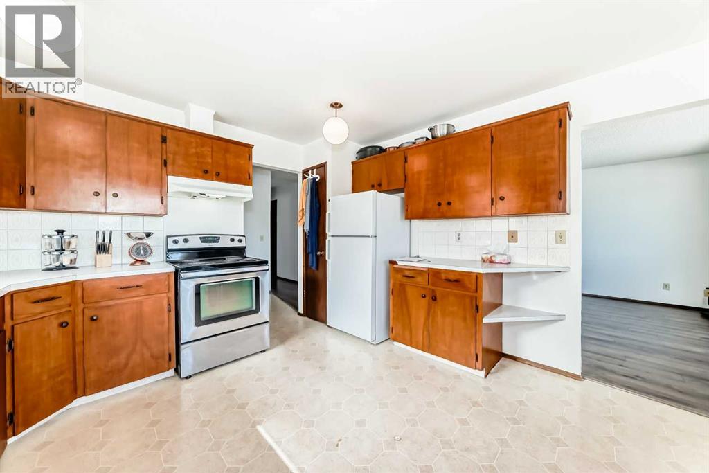 Multi-family House Bi-level for Sale in  Rundlehorn Drive NE Pineridge Calgary 