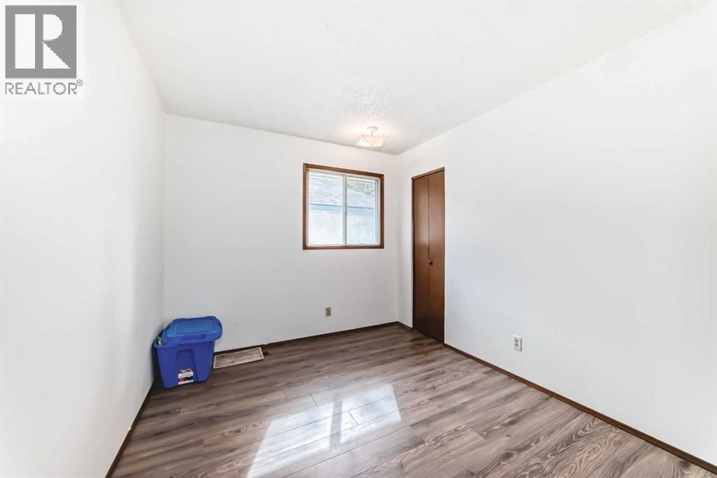 Multi-family House Bi-level for Sale in  Rundlehorn Drive NE Pineridge Calgary 