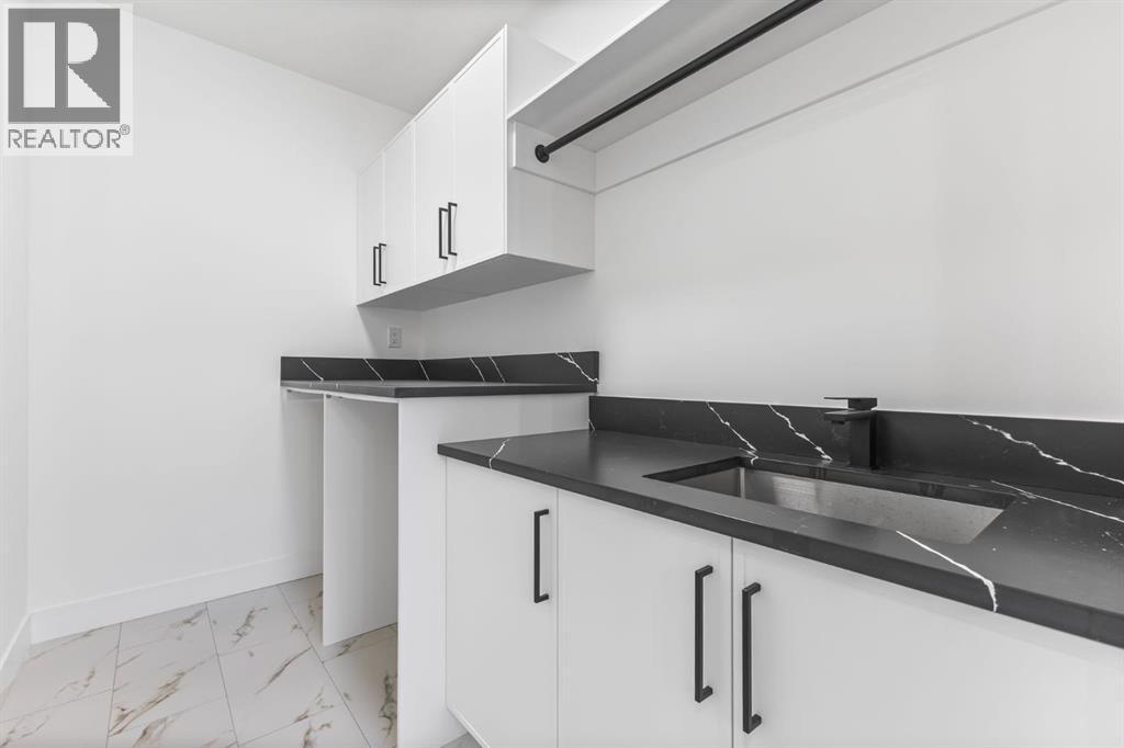 Single Family House for Sale in   Avenue SW Rosscarrock Calgary 