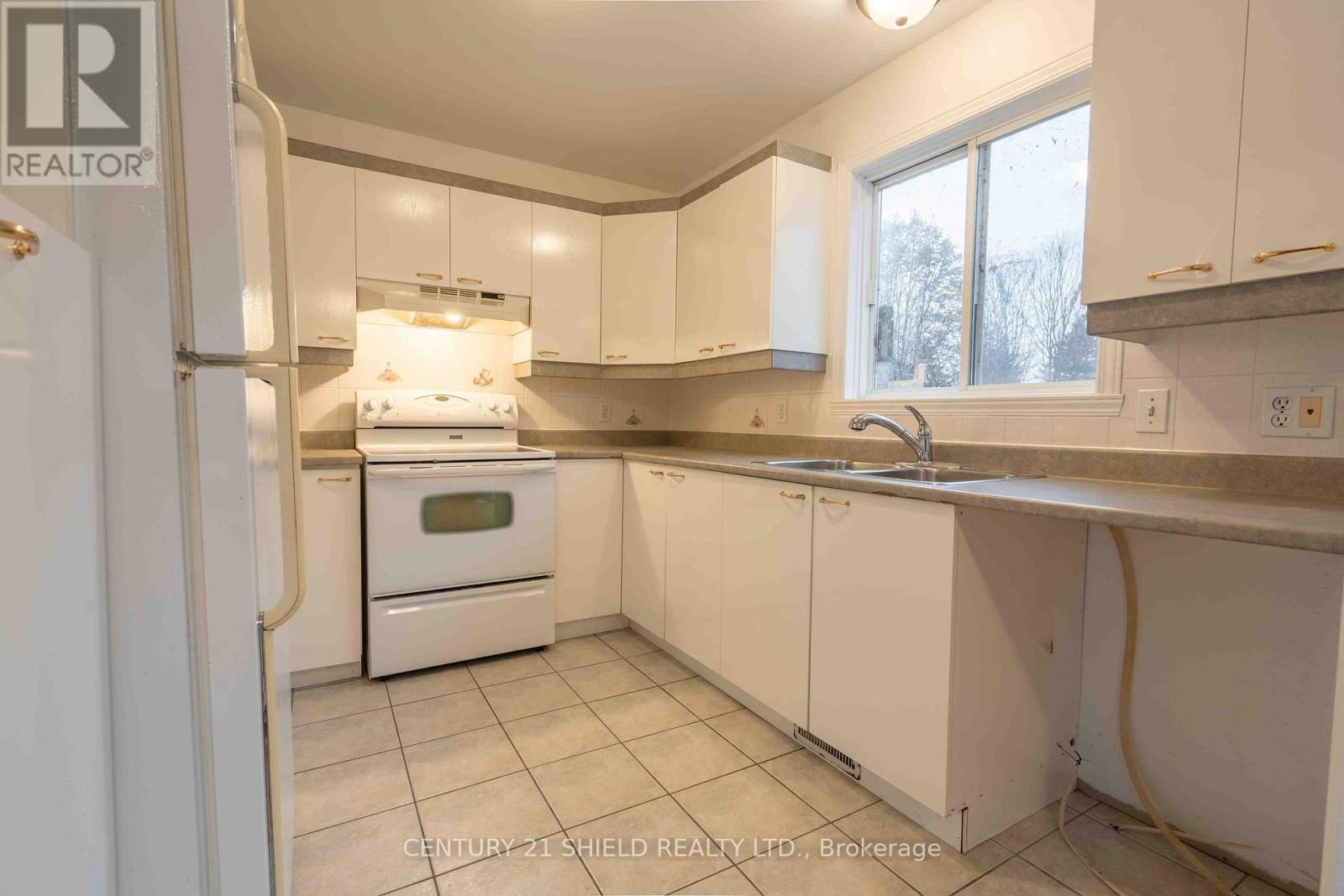 21255 MCNAUGHTON COURT E - 12